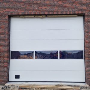 Dynaco Overheaddeur, RAL9002, elektrisch, Wagenberg